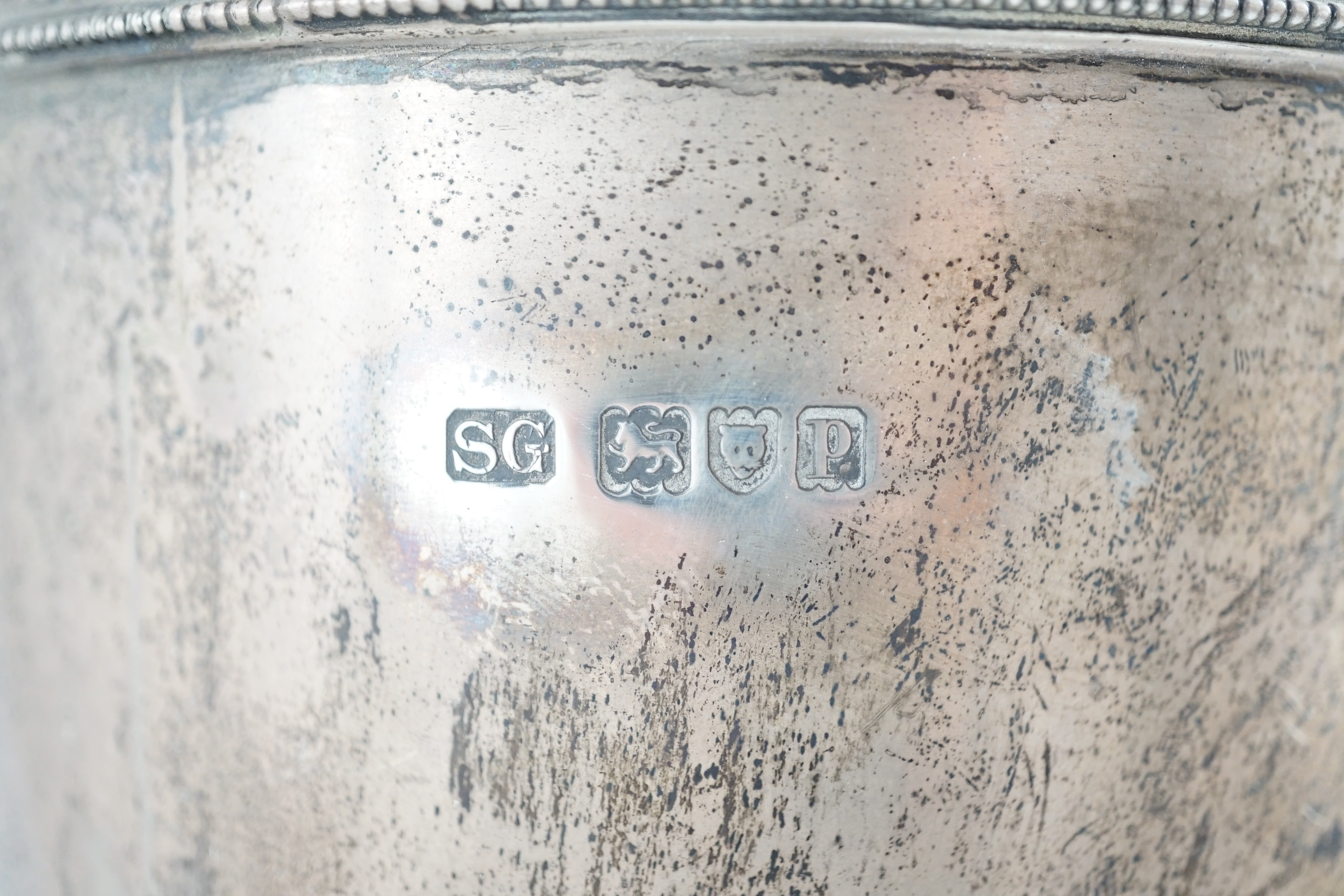 A George V silver two handled cup and cover by Sebastian Garrard